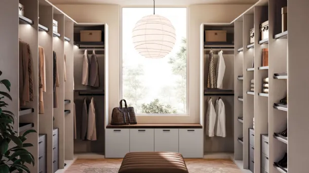 Open walk-in closet in matte lacquer and metal by Orme.