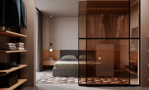 Night 17 walk-in closet with sliding glass doors by Nardi Interni.