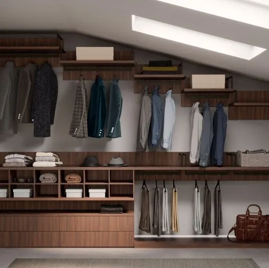 Open Attic Walk-in Closet in melamine with a Cotto finish by Nardi Interni.
