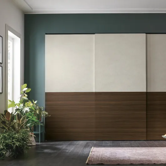 Double wardrobe with sliding door in light woven materico and thermally treated oak materico by Tomasella.