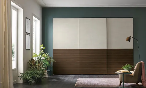 Double wardrobe with sliding door in light woven materico and thermally treated oak materico by Tomasella.