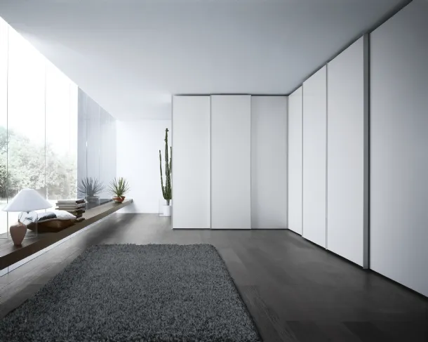 Dover sliding corner wardrobe by Novamobili.
