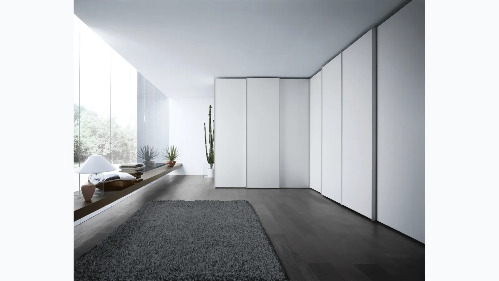 Dover sliding corner wardrobe by Novamobili.