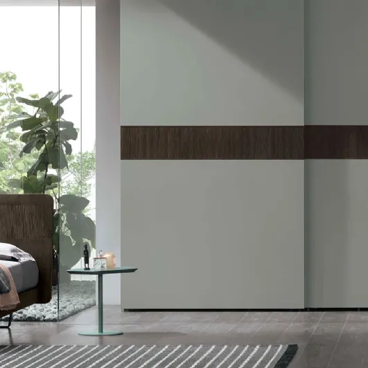 Wardrobe with sliding door in matte lacquered finish with Oak Frame insert by Tomasella.