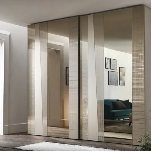 Madras wardrobe with sliding mirrored door decorated with various effects by Tomasella