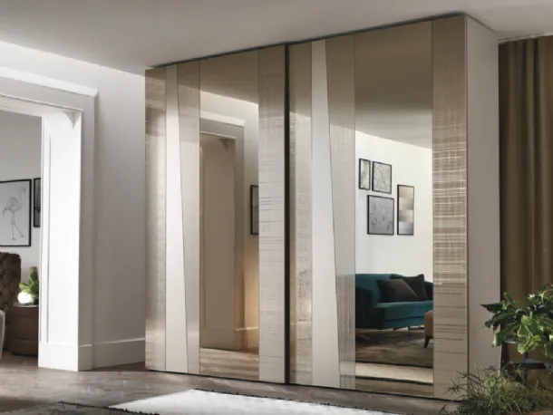 Madras wardrobe with sliding mirrored door decorated with various effects by Tomasella
