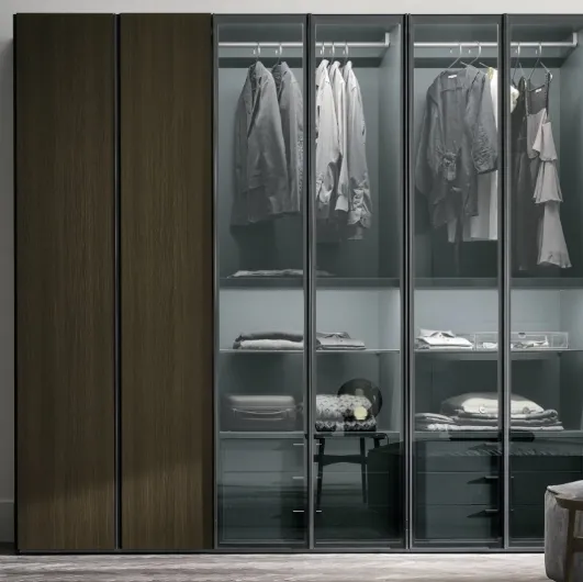 Metropolis wardrobe in thermally treated oak material with doors in thermally treated oak material and smoked glass 363 by Tomasella.