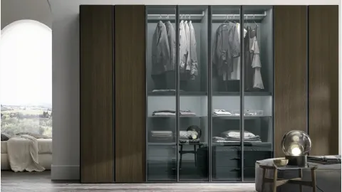 Metropolis wardrobe in thermally treated oak material with doors in thermally treated oak material and smoked glass 363 by Tomasella.