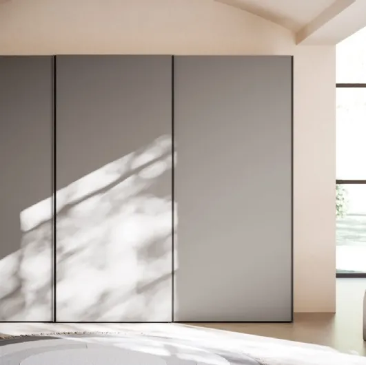 Night 24 sliding door wardrobe in matt lacquered Titanium by Orme.