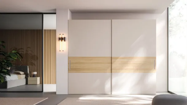 Night 35 wardrobe with sliding doors in Matte Sand lacquer and Rovere textured Oak by Orme.
