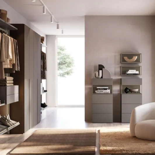 Palko walk-in closet in lacquered finish with Orme melamine wardrobe.