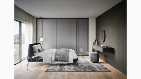 Plissé sliding wardrobe by Novamobili