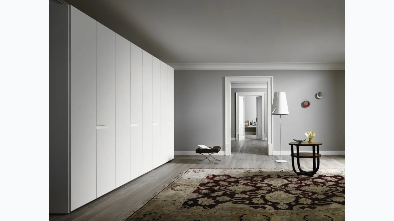 Sail wardrobe in white lacquered finish by Sangiacomo.