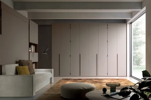 W23 07 Clever bookcase with hinged doors.