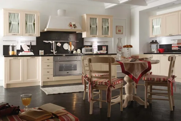 Classic corner kitchen in lacquered wood with glass display cabinets and a round solid spruce table Sweet Kitchen Romantic Light by Callesella.
