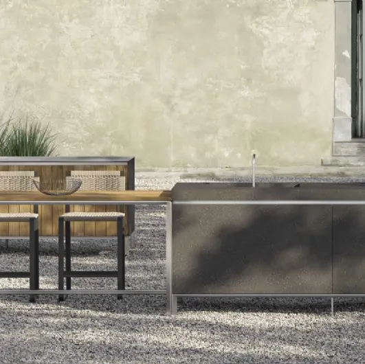 Outdoor Design kitchen with double Helios volcano ceramic and teak island by Molteni & C