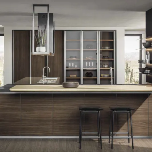 Hi-Line 6 Frame Door kitchen design with peninsula, with a Walnut base, a stainless steel and Black Lava top, and a knotty blond Oak snack counter from Molteni & C.