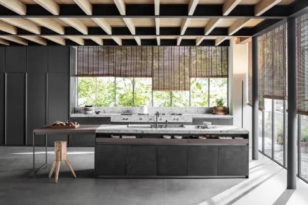 Design kitchen with island VVD in railway steel and top in Molteni & C Ceppo stone.