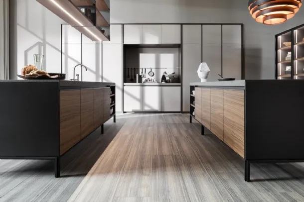 Design kitchen with VVD island in Walnut with a Green Porphyry top and matte lacquered columns by Molteni & C