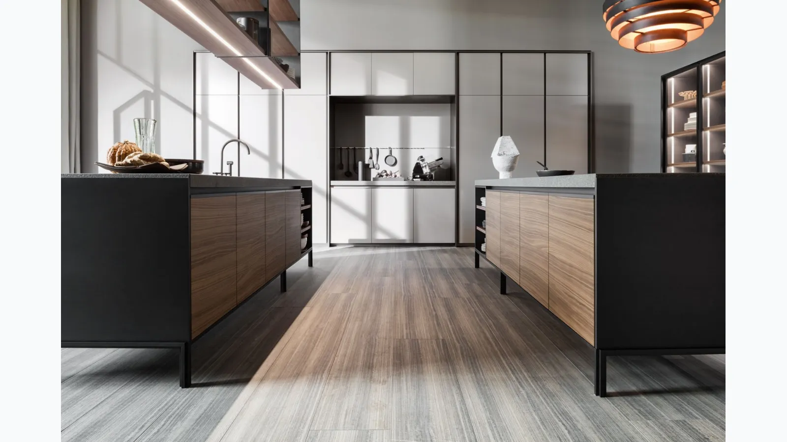 Design kitchen with VVD island in Walnut with a Green Porphyry top and matte lacquered columns by Molteni & C