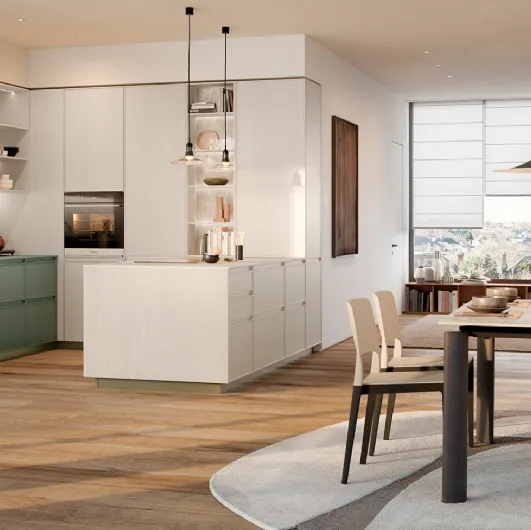 Modern kitchen with the Sakura 07 island in matte lacquered green ash and cream lacquered ash by Veneta Cucine.