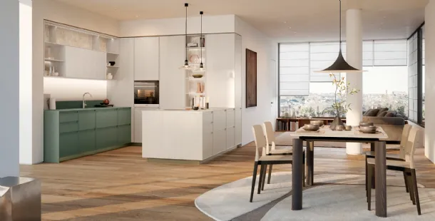 Modern kitchen with the Sakura 07 island in matte lacquered green ash and cream lacquered ash by Veneta Cucine.