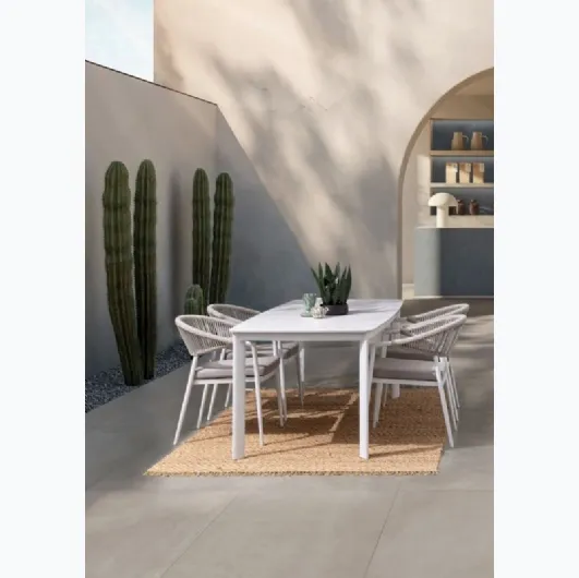 Alcora table with a Bizzotto stone top.