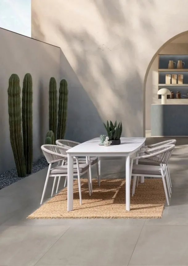 Alcora table with a Bizzotto stone top.
