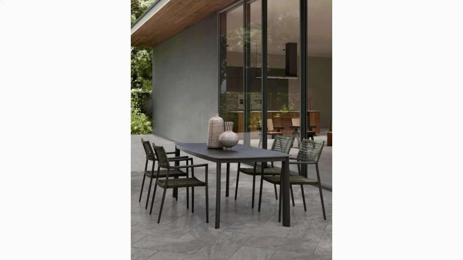 Alcora table with a Bizzotto stone top.