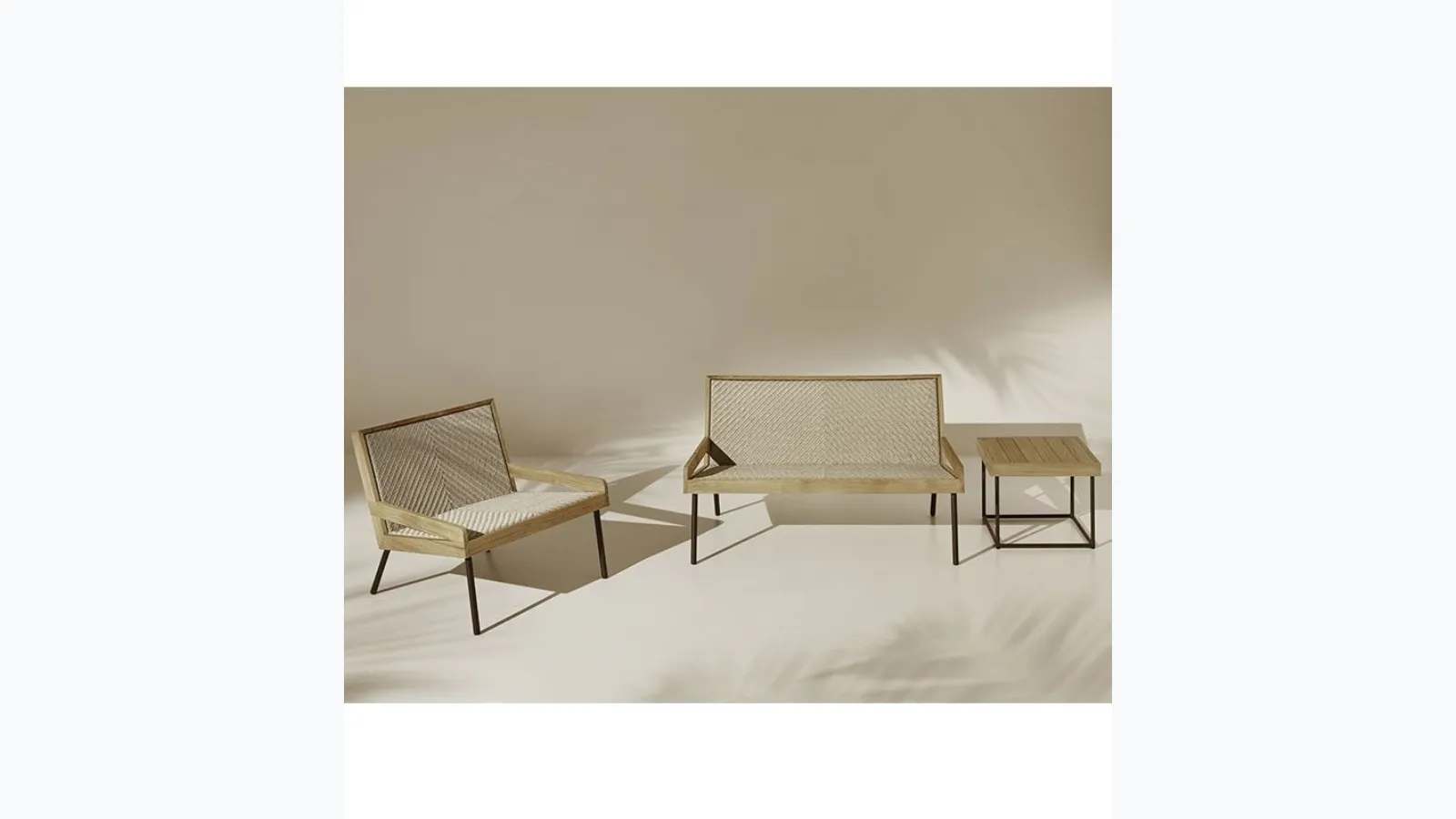 Outdoor lounge set in Teak and Flat Rope by Ethimo.