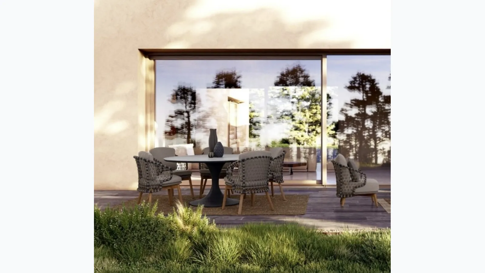 Round table with Arnold stone top by Bizzotto.