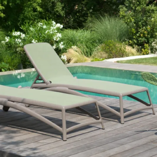 Stackable Sun Lounger without armrests in breathable Atlantic fabric by Nardi