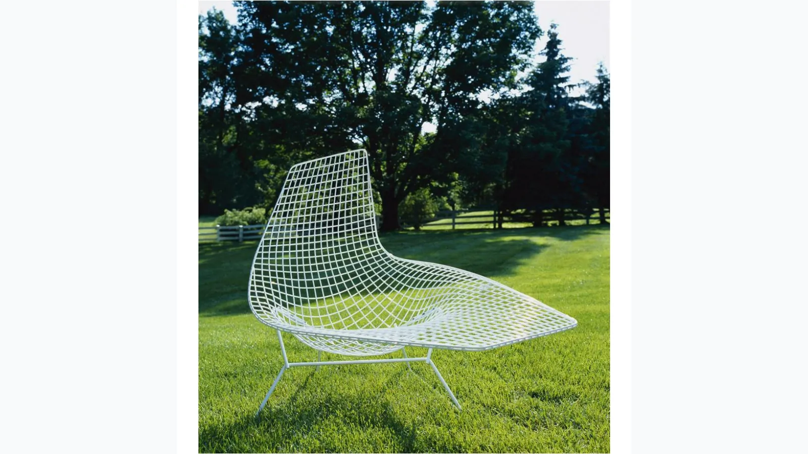 Bertoia Asymmetric Chaise lounge chair in metal by Knoll.