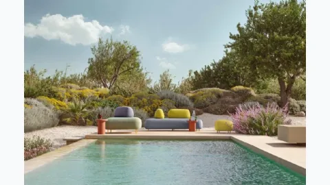 Outdoor Buddy Oasis by Pedrali is a lounge area.