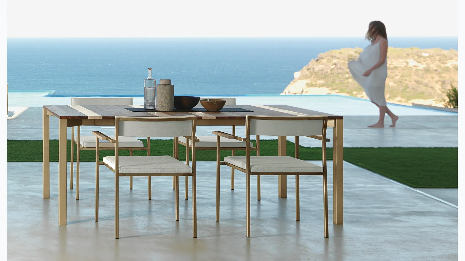 Wooden table with Casilda fabric chairs by Talenti.