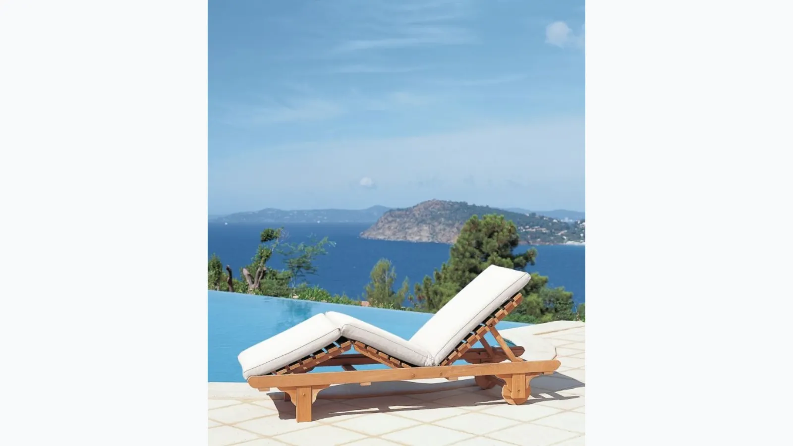 Chelsea teak lounge bed with padded fabric cushion from Unopiu.