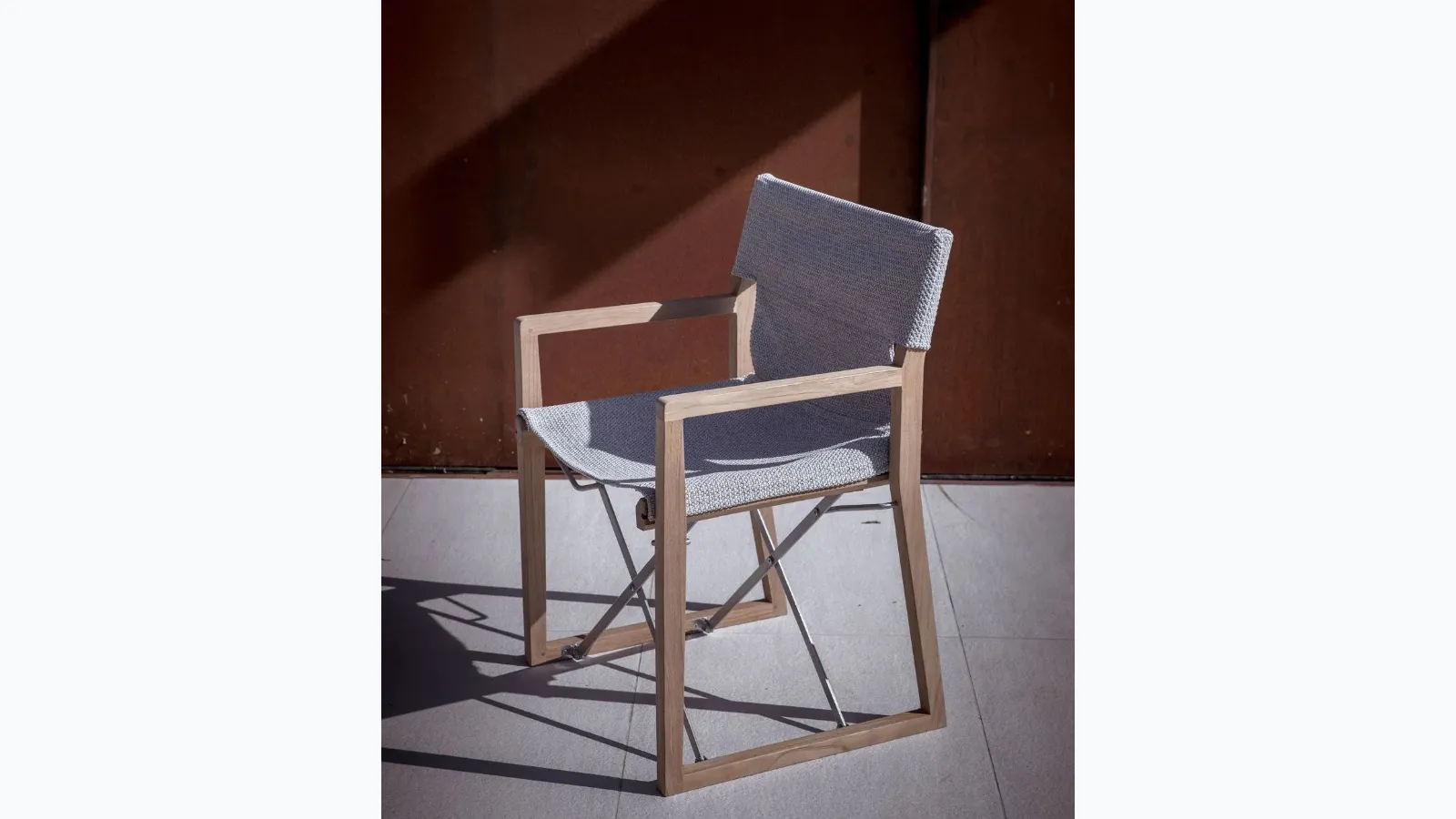 Cosette armchair in teak and polypropylene fabric by Unopiu.