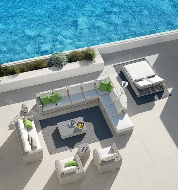 Outdoor lounge area in Etwick Cube fiber by Ethimo.