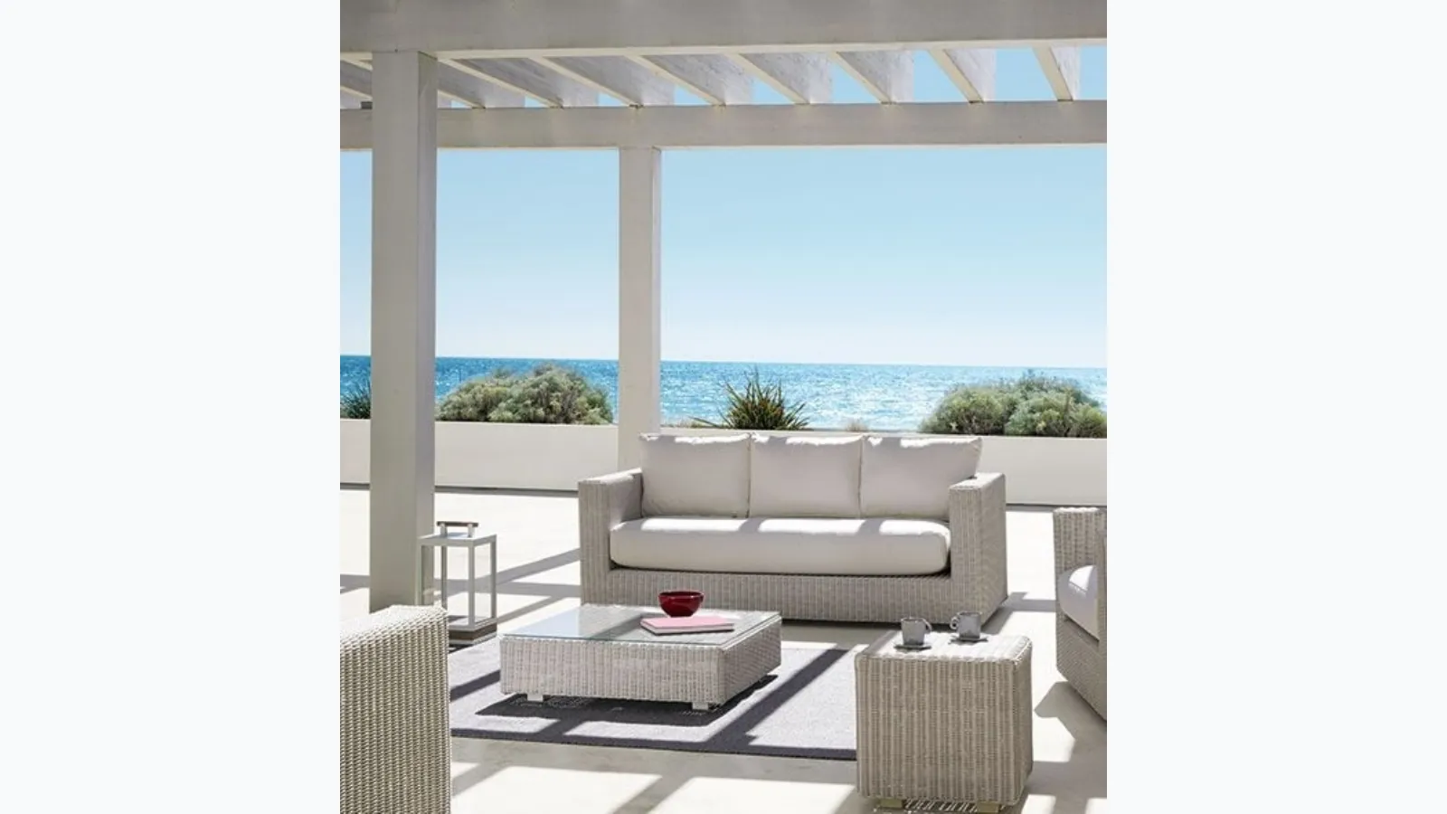 Cube coffee table in synthetic fiber with glass top from Ethimo