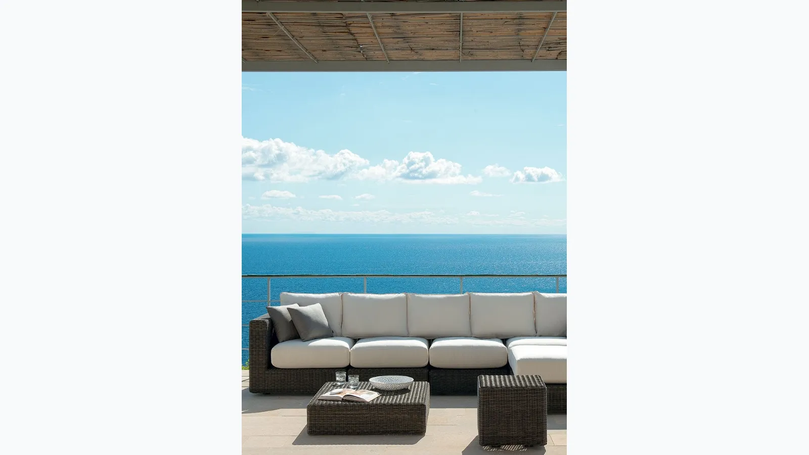 Cube coffee table in synthetic fiber with glass top by Ethimo.