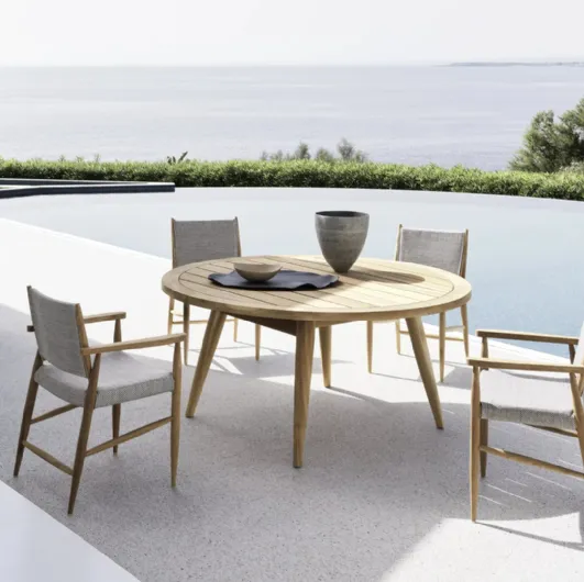Round table Eidos in teak by Gervasoni