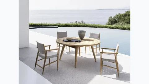 Round table Eidos in teak by Gervasoni