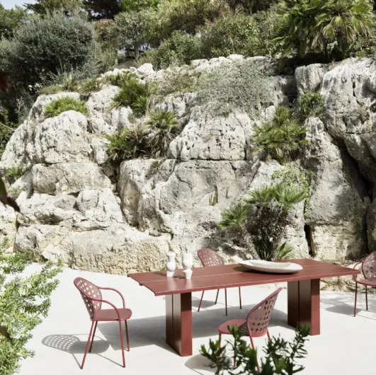Eidos table in polystyrene with a concrete base by Gervasoni.