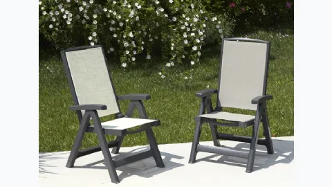 Folding armchair with polypropylene structure and seat and backrest in breathable, water-repellent Esmeralda Lux fabric by Scab Design.