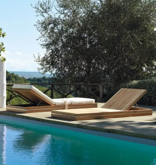 Teak essence sunbed by Ethimo