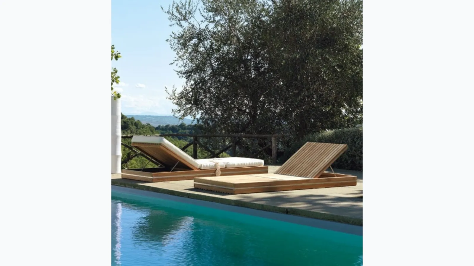 Teak essence sunbed by Ethimo