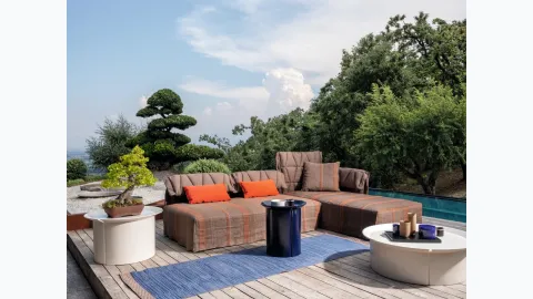 Flair sofa upholstered in fabric by Gervasoni.