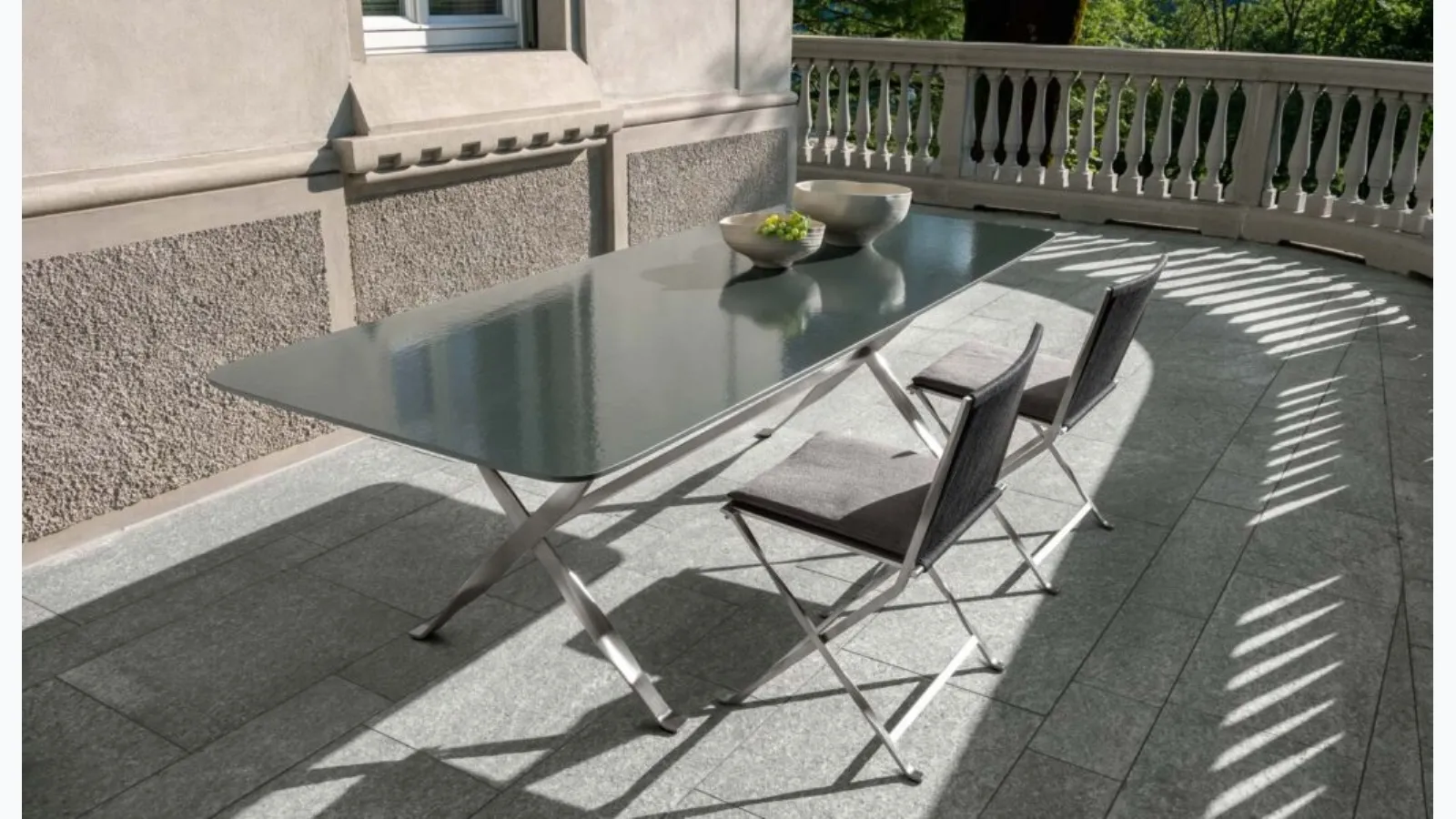 Lava stone glazed George table by Talenti.