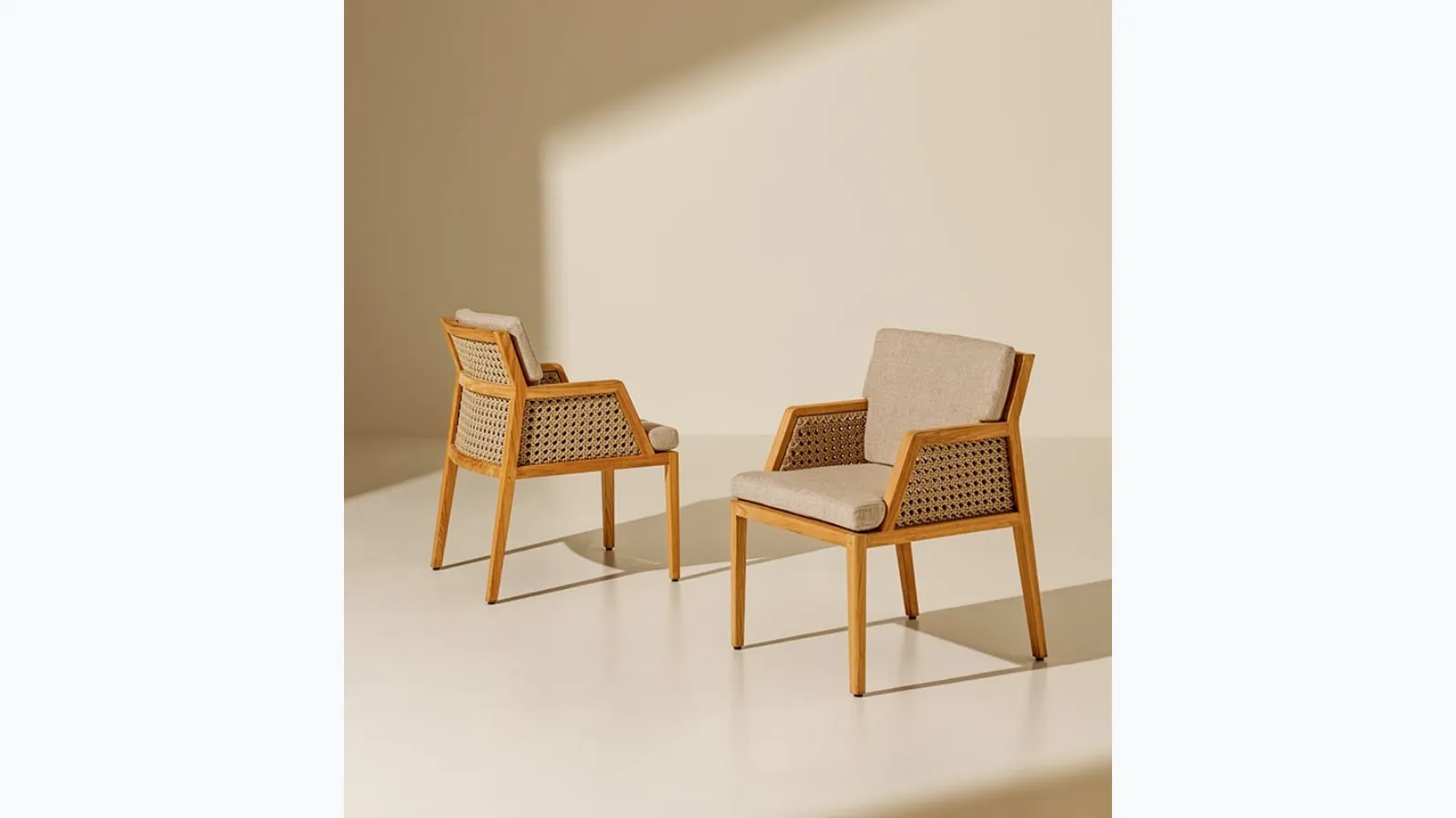 Grand Life armchair in teak, rope, and Ethimo fabric.