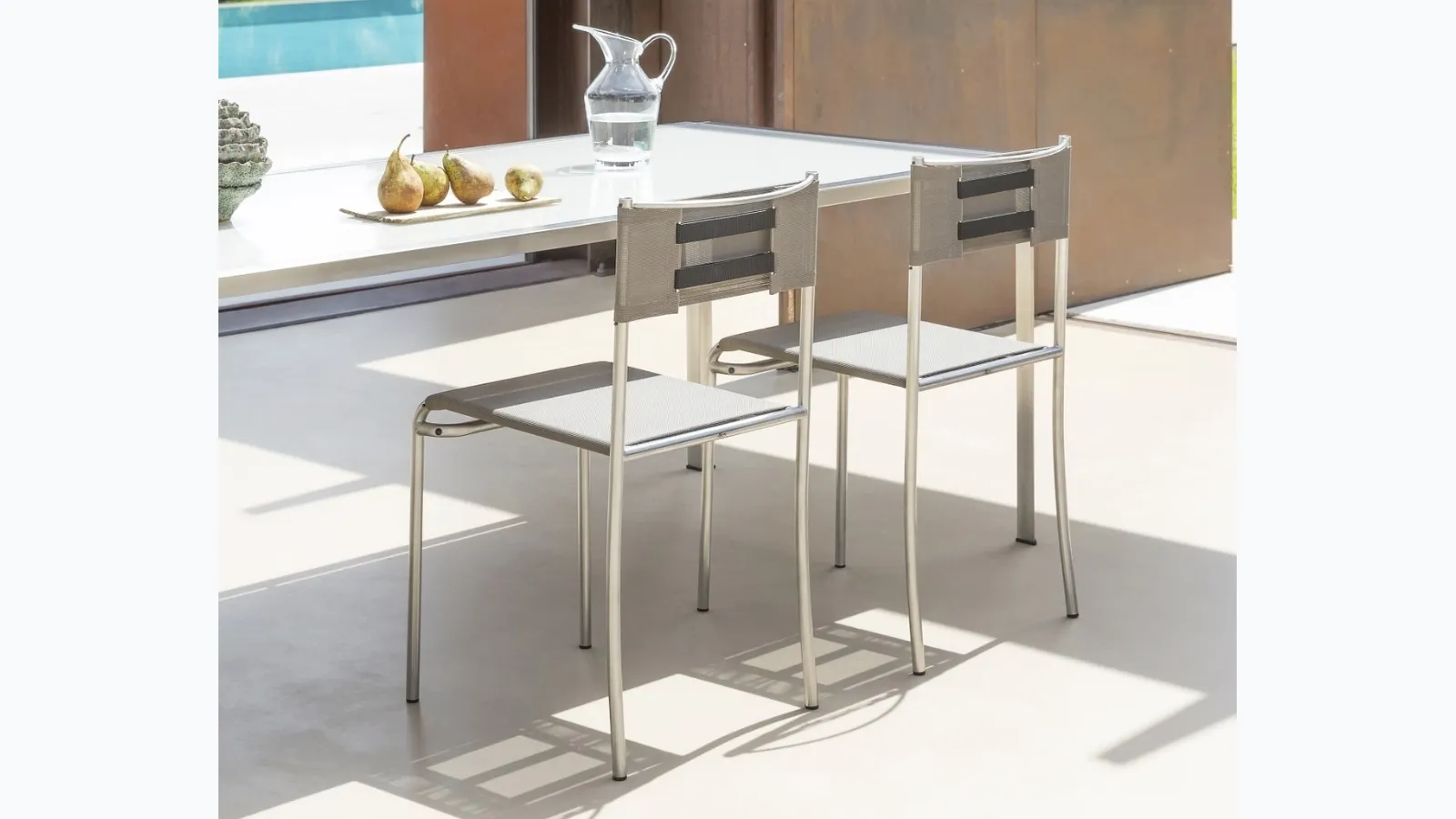 Green Gemini chair by Alias